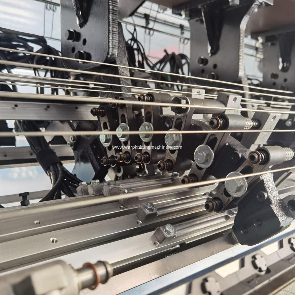 warp knitting machine multibar raschel model flexible string bar machine à tricoter chaîne multibar modèle raschel barre de ficelle flexible