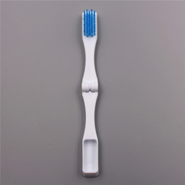 Doblar el cepillo de dientes pre-pegado