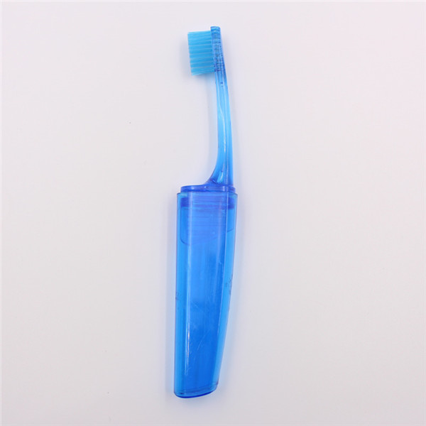 Brosse à dents pliante transparente avec poignée en PS