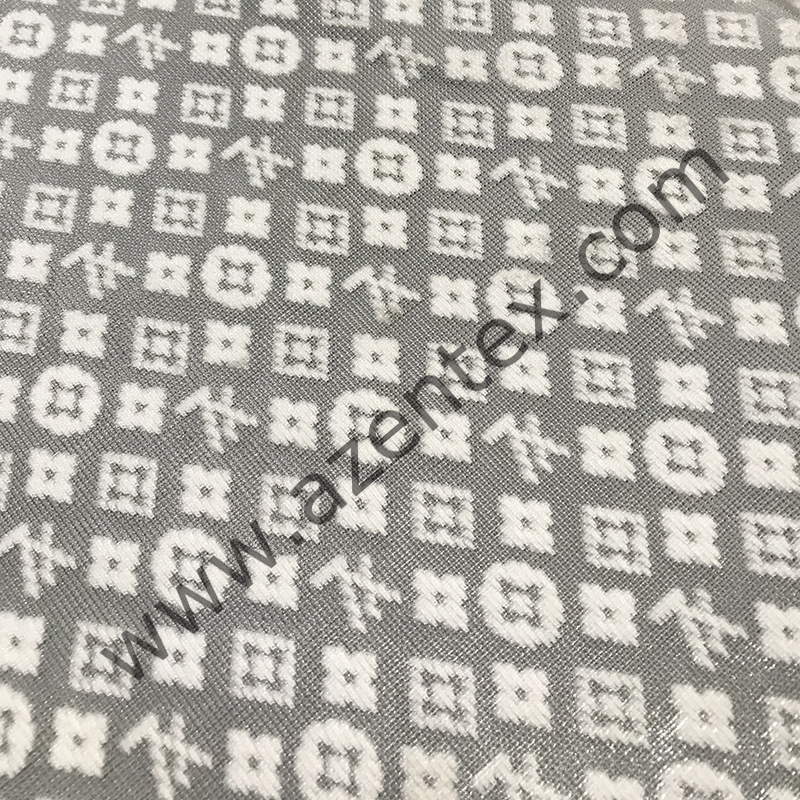 tela jacquard con barra de doble aguja
