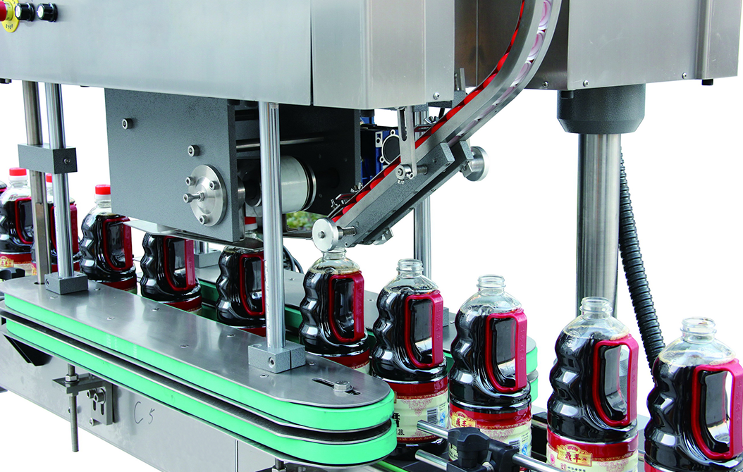Machine de capsulage sous pression 