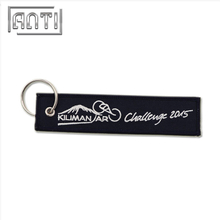 Custom Black Coloring Eyelet Overlock Embroidery Jacquard Woven Keychain 