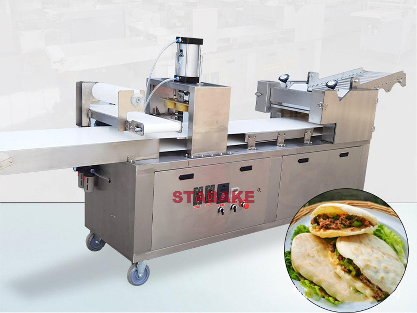 Pneumatic pizza base making machine